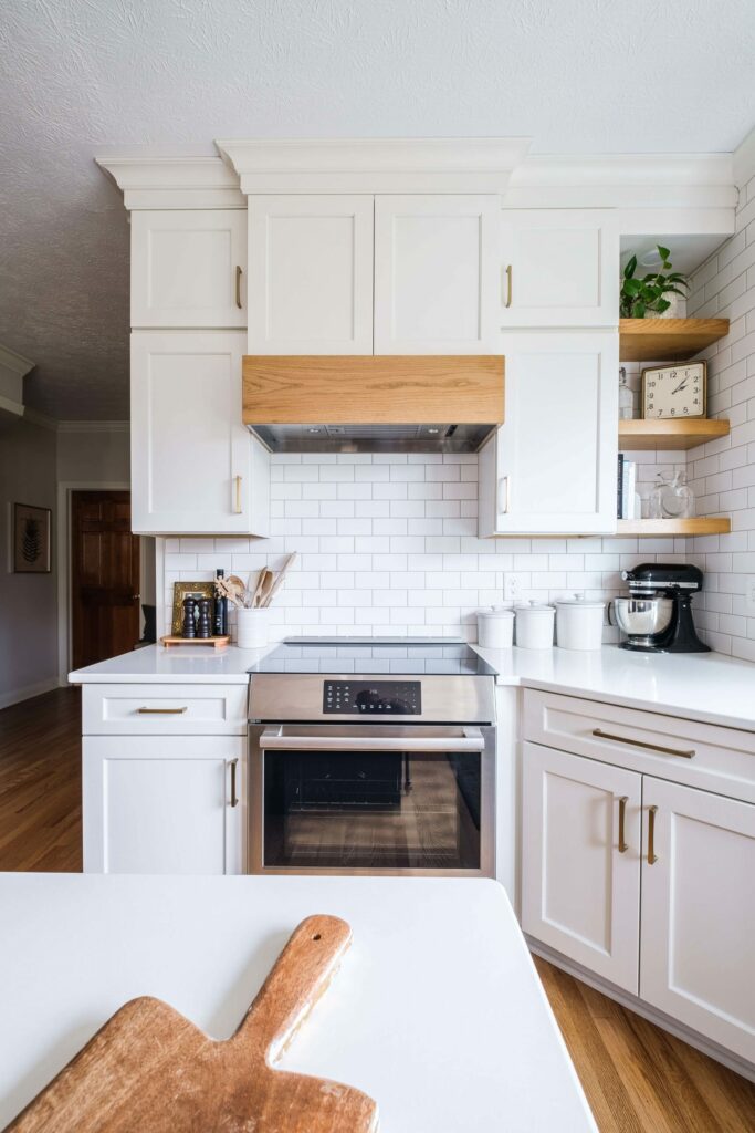 Stained wood shelves and vent hood Kitchen Remodel Lindsey Putzier Design Studio