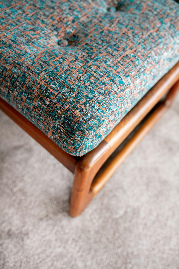 Reupholstered furniture in orange and teal tweed Owner's Suite Lindsey Putzier Design Studio Ohio