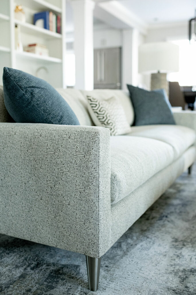 Tuxedo Style sofa with tortiseshell steel fabric and denim pillows Lindsey Putzier Design Studio Hudson, OH
