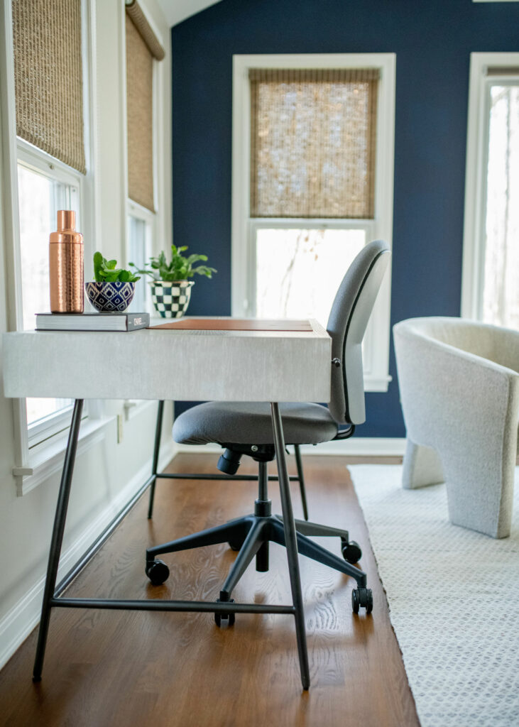 Writing desk in flannel finish with matte black in Sunroom Lindsey Putzier Design Studio Hudson, OH