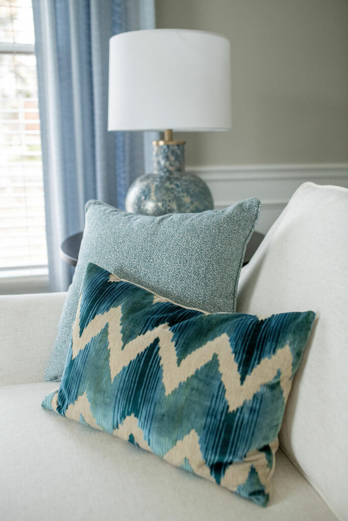 Blue and cream chevron accent pillow in Office / TV Room Lindsey Putzier Design Studio Hudson, OH