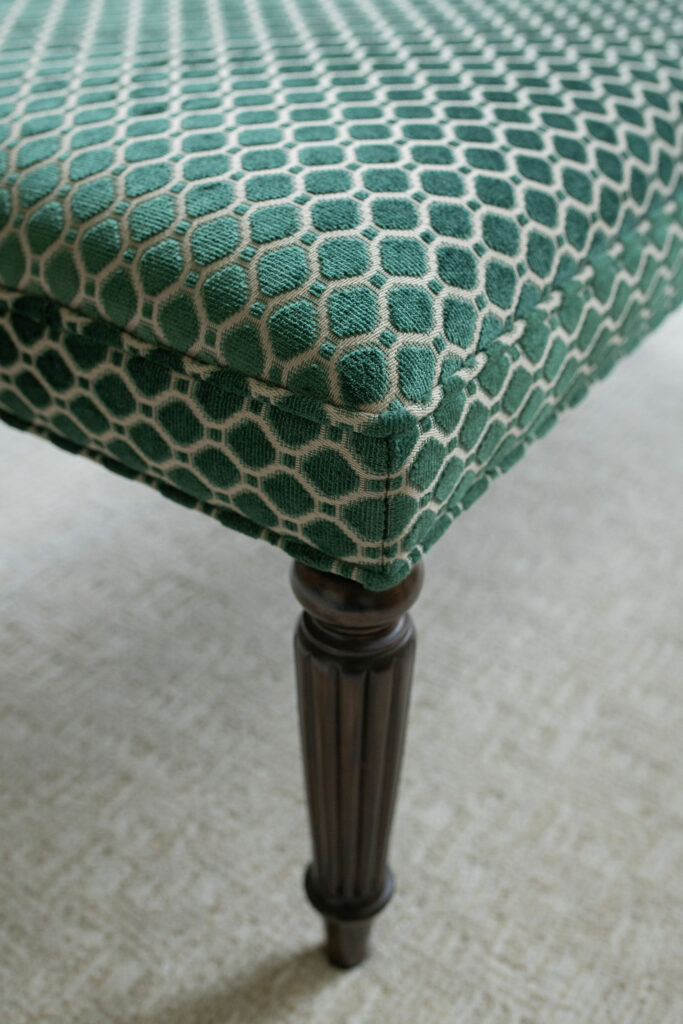 Custom upholstery ottoman with green patterned fabric. Lindsey Putzier Design Studio Hudson, OH