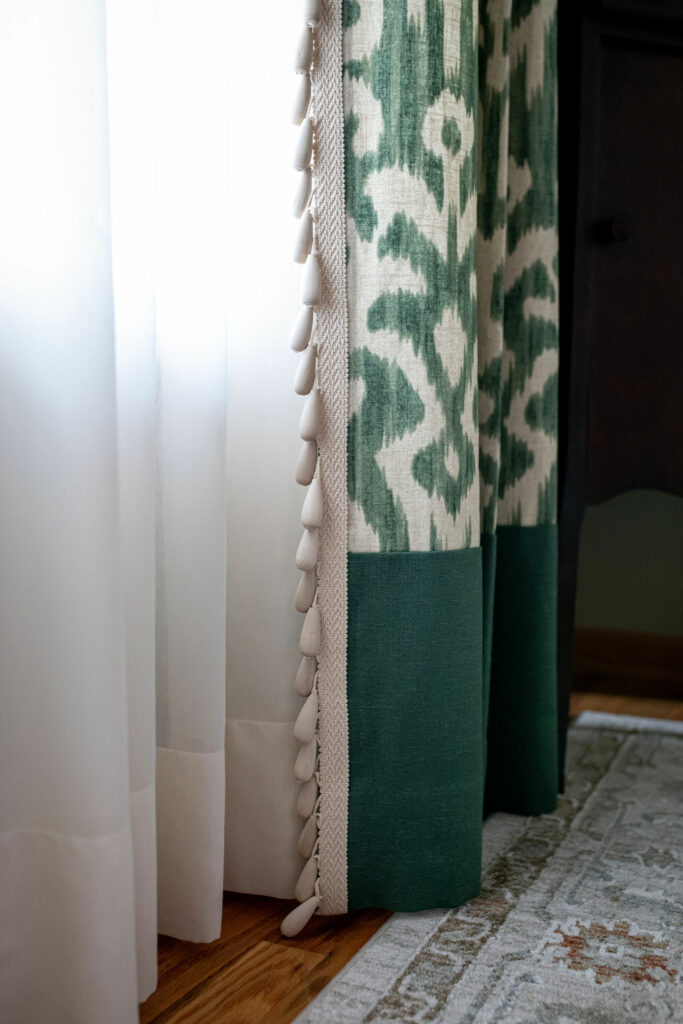 Custom drapery window treatment for Dining Room. Green patterned fabric with bead tassel trim. Lindsey Putzier Design Studio Hudson, OH