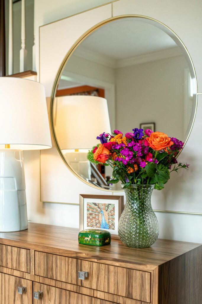 Foyer design with new cabinet, table lamp, and mirror. Lindsey Putzier Design Studio Hudson, OH