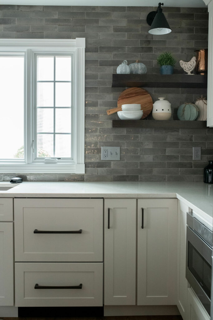 Paneled appliances in  Kitchen cabinetry. Lindsey Putzier Design Studio Hudson, OH