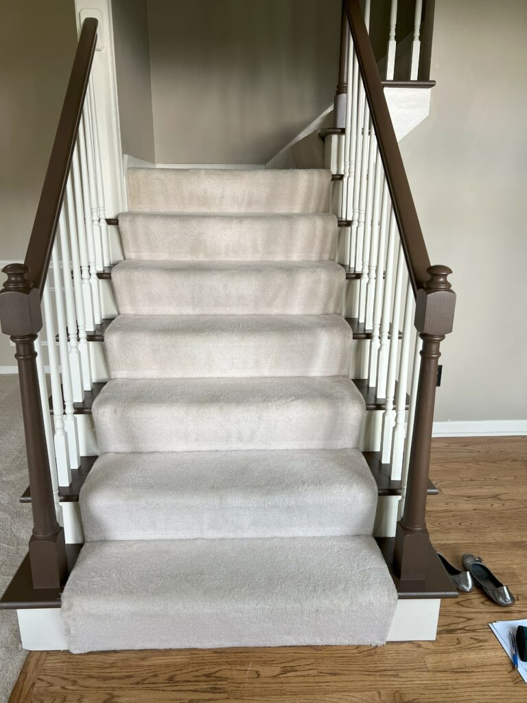 Before image of Foyer Stairs. Lindsey Putzier Design Studio. Hudson, OH