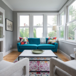 Sunroom Design pulling in blues and pinks through the sofa, rug, and accent pillows. Lindsey Putzier Design Studio. Hudson, OH