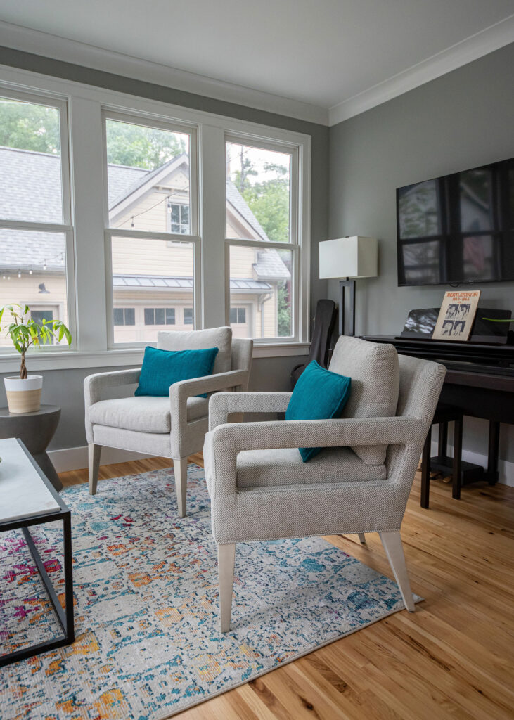 New, streamlined, contemporary gray chairs for Sunroom Design. Lindsey Putzier Design Studio Hudson, OH