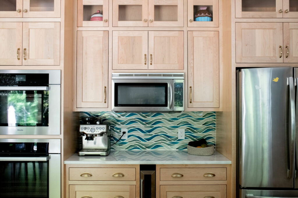 After image of oven / fridge area. Solon, OH. Lindsey Putzier Design Studio