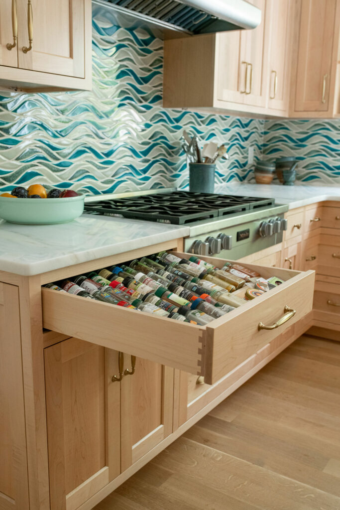 Custom storage inserts within cabinetry. Solon, OH Lindsey Putzier Design Studio