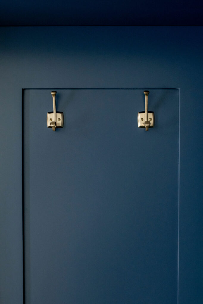 Blue cabinetry storage in Mudroom design. Lindsey Putzier Design Studio. Hudson, OH