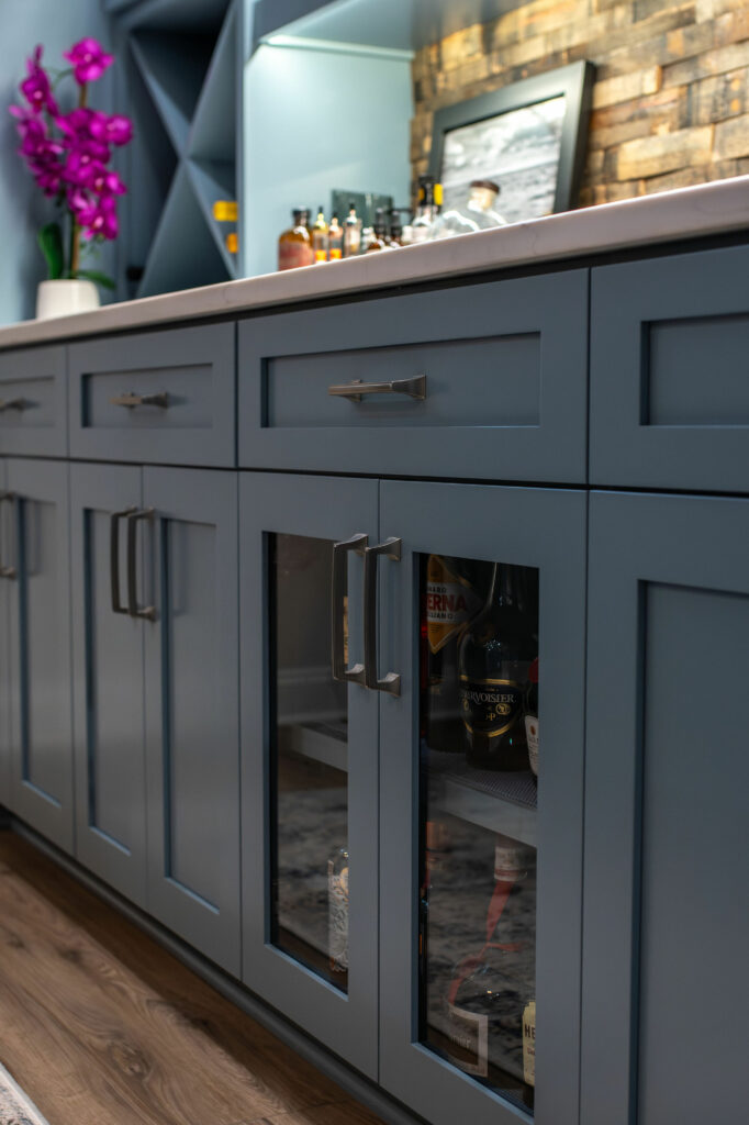 Additional storage types within cabinetry of Whiskey Bar design. Lindsey Putzier Design Studio Hudson, OH