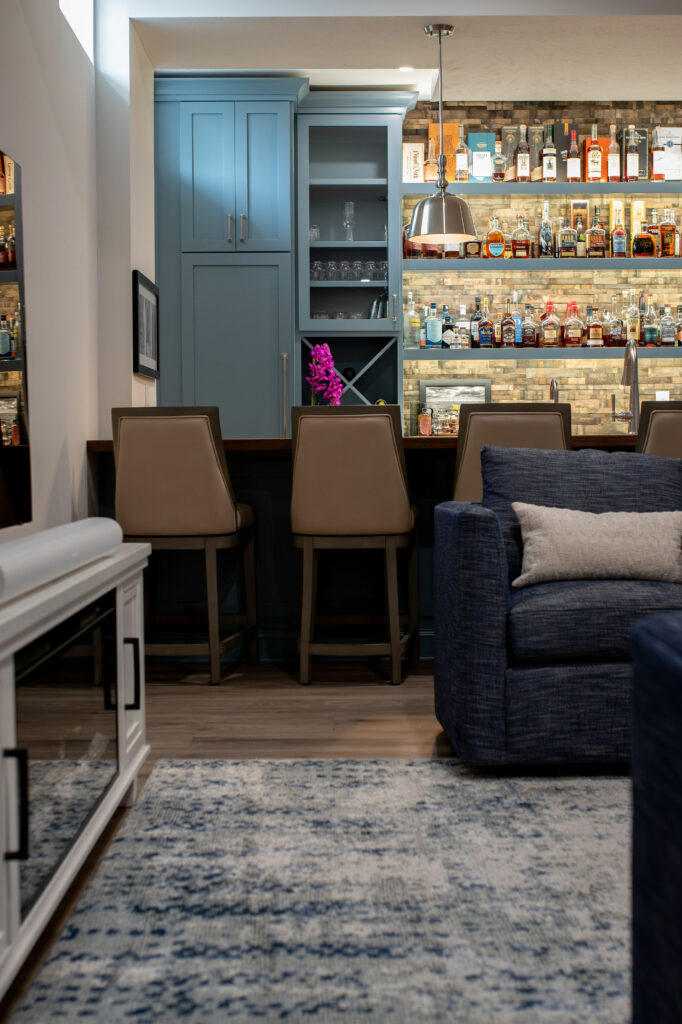 Looking at the bar from the lounge area in Whiskey Bar design. Lindsey Putzier Design Studio Hudson, OH