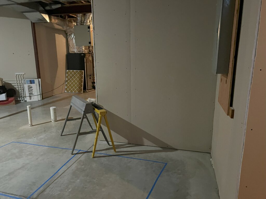 Before image of basement. Lindsey Putzier Design Studio Hudson, OH
