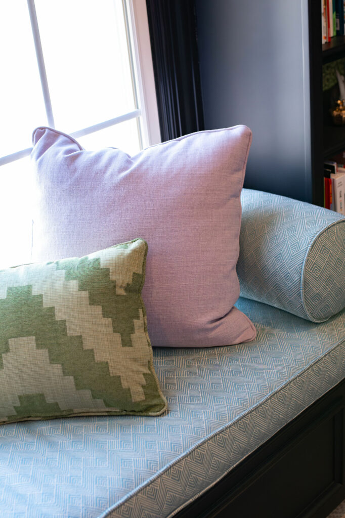 Close-up of window seat cushion and custom pillows. Lindsey Putzier Design Studio Hudson, OH