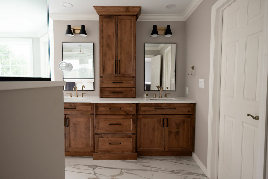 After image of double vanity with maple cabinets in Primary Bathroom. Lindsey Putzier Design Studio Hudson, OH