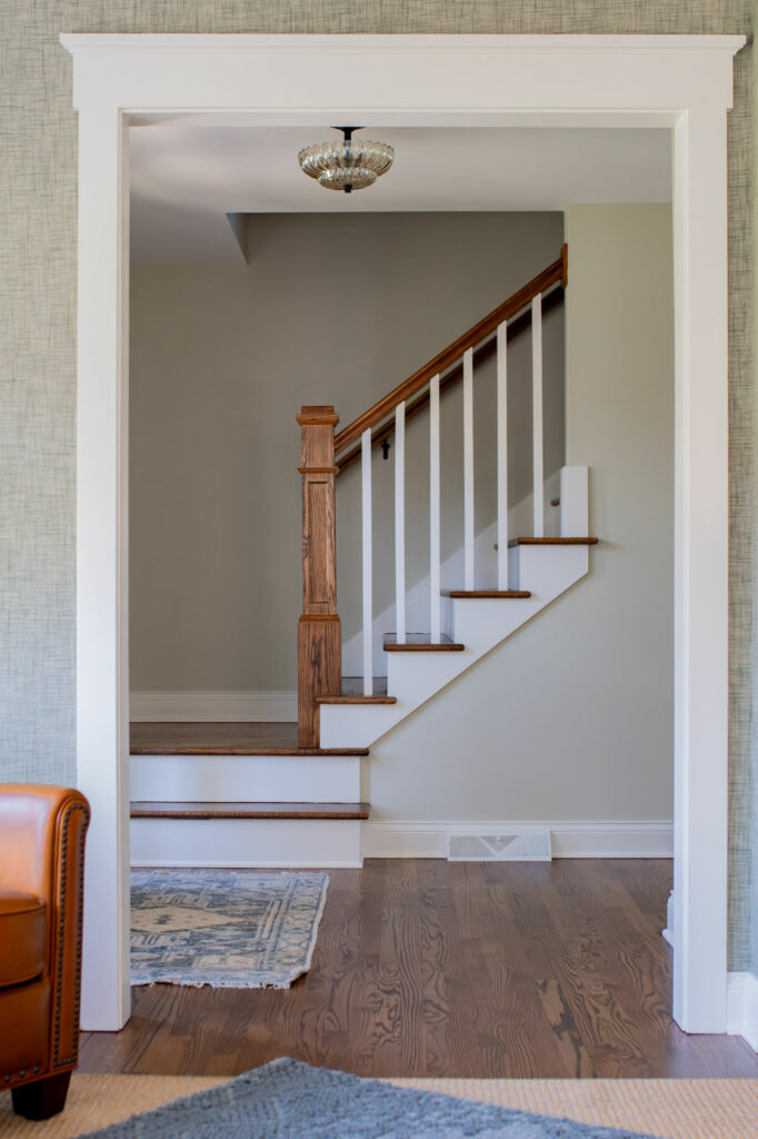 After shot of the finished stairs with the banister in place. Lindsey Putzier Design Studio, Hudson, Ohio