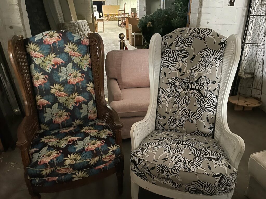 Two vintage arm chairs from an antiques store with mesh wicker sides. Lindsey Putzier Design Studio, Hudson, Ohio