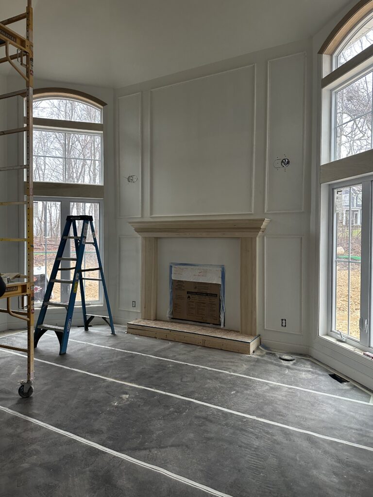 During the process of build out, the fireplace and living room. Lindsey Putzier interior design Chagrin Falls Ohio 