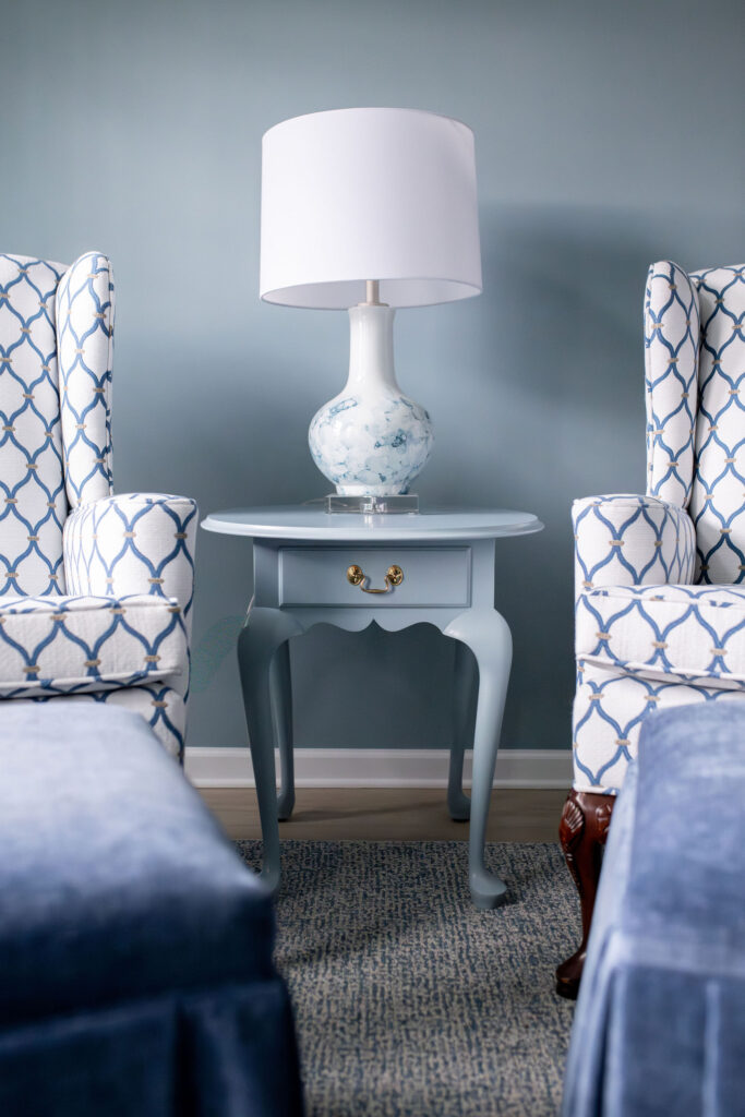 Custom upholstered indigo patterned chairs in the master bedroom. Peninsula Ohio Lindsey Putzier interior design