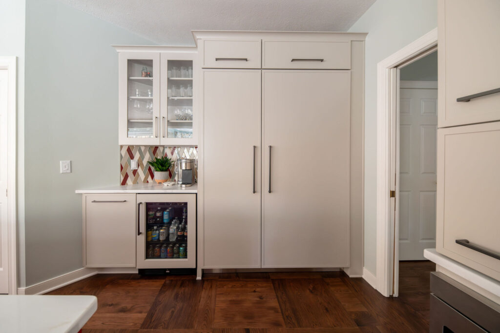After of Fridge and pantry in Updated kitchen with large chefs fridge in a cream finish, wine fridge, and a coffee bar.