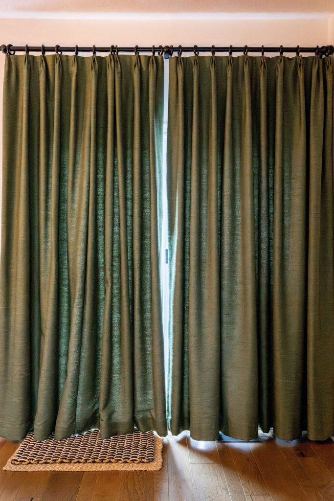 Custom window Treatments in the kitchen in a bold green color. Lindsey Putzier interior design Copley Ohio 