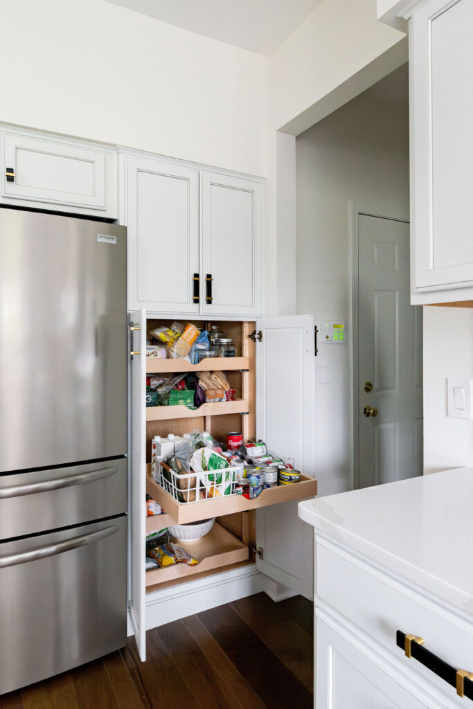 New storage and organization in the kitchen cabinets custom built in. Copley Ohio Interior design Lindsey Putzier 