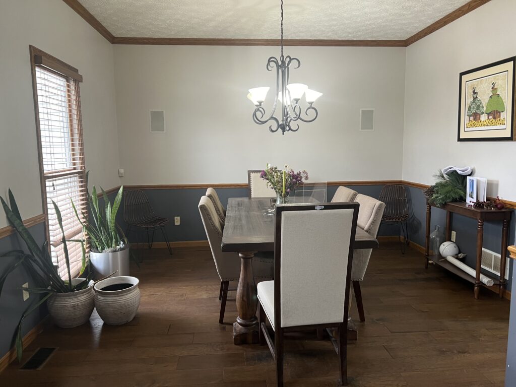 Before of formal dining room in Copley, Ohio with dark trim and beige color pallet. Lindsey Putzier interior design 