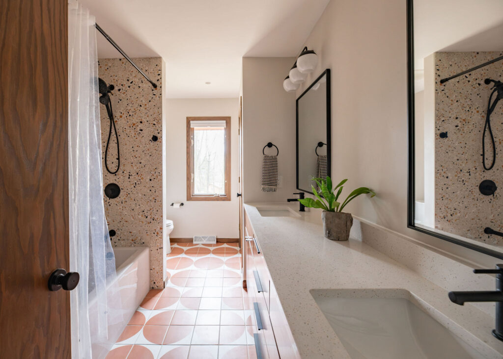 Bathroom in Akron Ohio with warm earthy colors and woods. Lindsey Putzier interior design