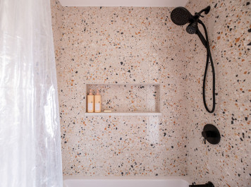 Earthy Oasis: A Dual Bathroom Transformation