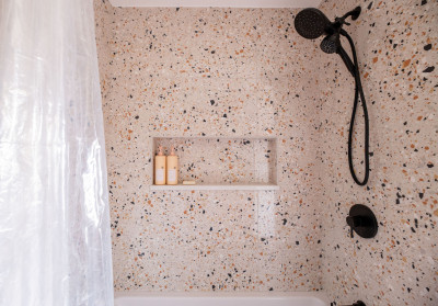 Earthy Oasis: A Dual Bathroom Transformation