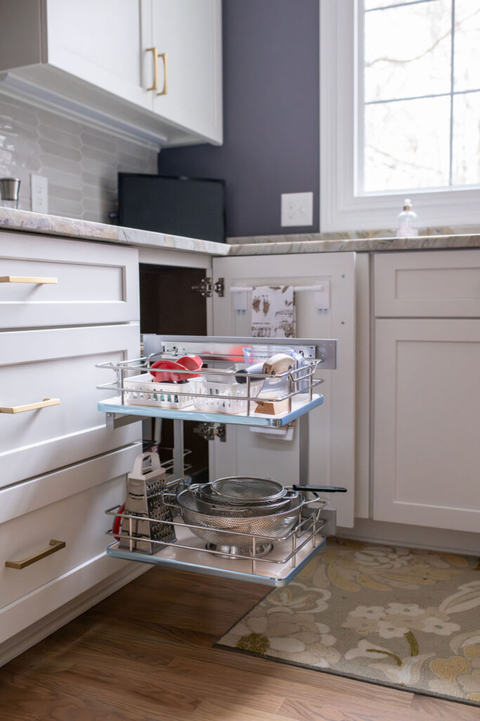 Corner cabinetry with custom pullout storage. Lindsey Putzier interior design