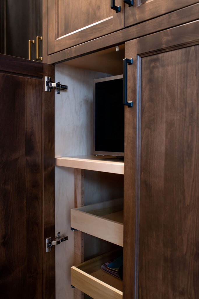 Hidden microwave in the kitchen with custom cabinet insert. Lindsey Putzier interior design