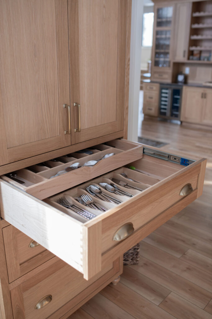 custom silverware drawer in the kitchen. Lindsey Putzier interior design