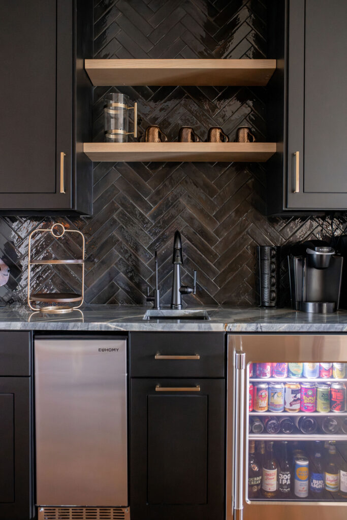 Kitchen in home bar with drink station including coffee, ice machine, wine fridge, and storage for glasses. Lindsey Putzier interior design  
