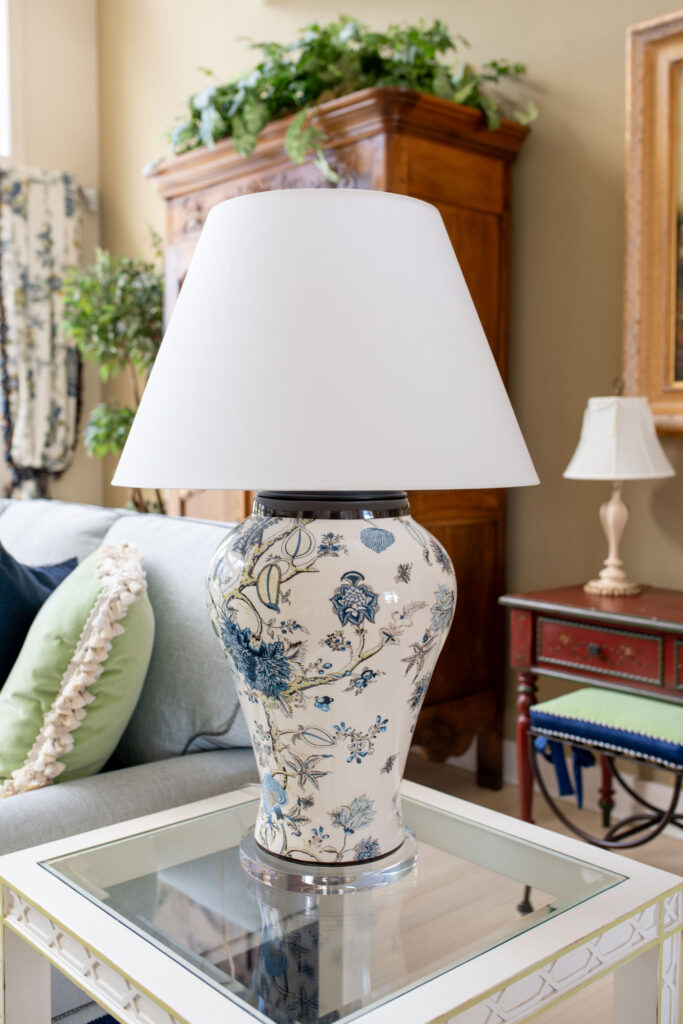 French inspired lamp in the living room with white shade. Lindsey Putzier interior design Aurora Ohio 