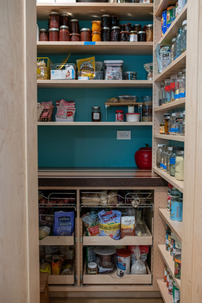 custom open produce shelving in the butlers pantry. Lindsey Putzier interior design.