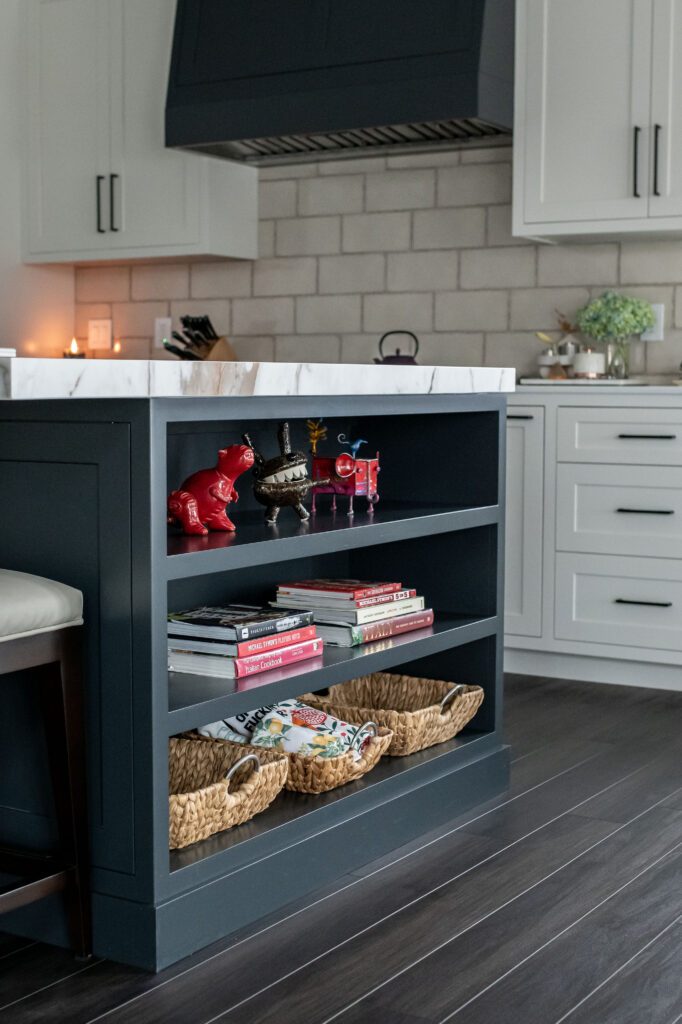 Open shelving in the kitchen to display design elements. Lindsey Putzier interior Design