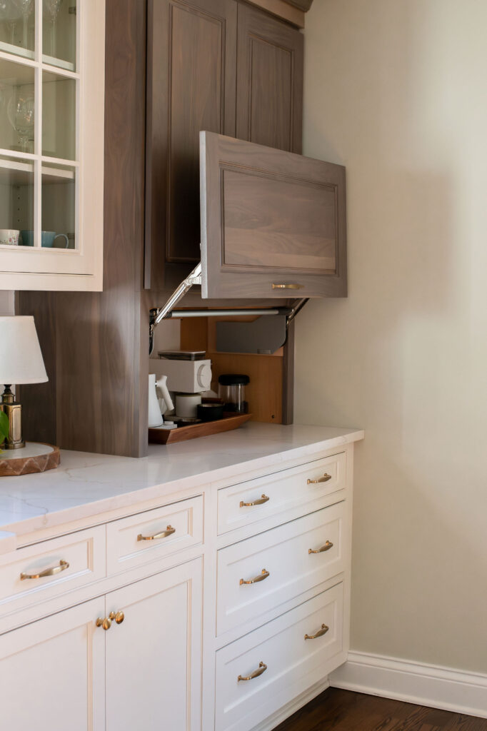 Custom appliance garage in the kitchen to conceal coffee makers. Lindsey Putzier interior design