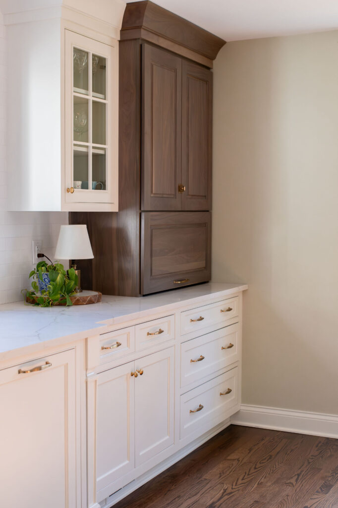 Custom appliance garage in the kitchen to conceal coffee makers. Lindsey Putzier interior design