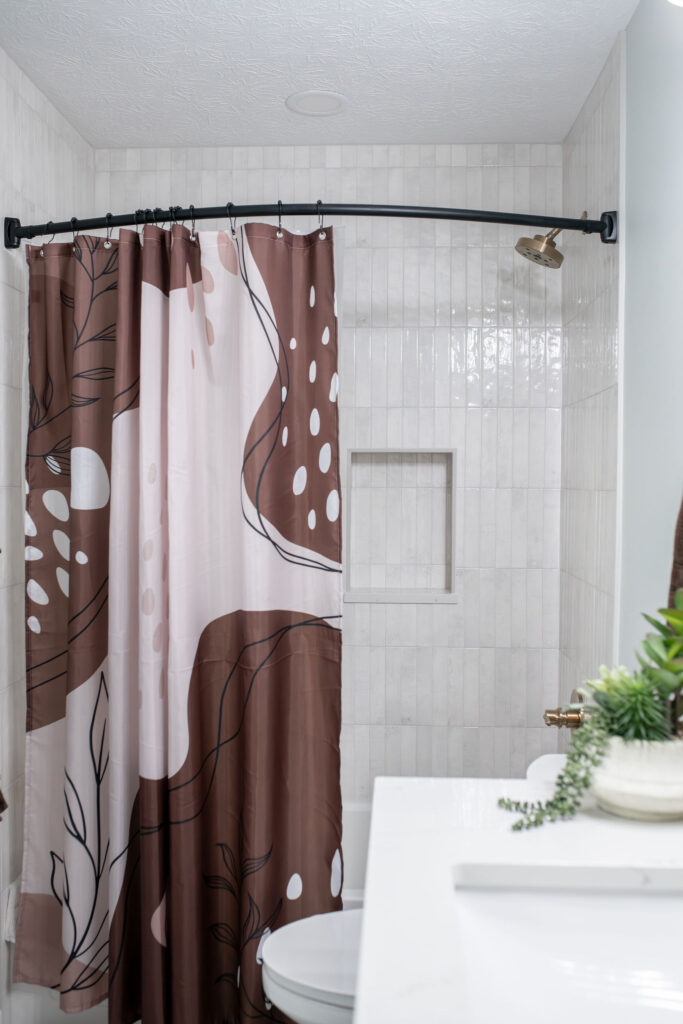 After of the bathroom with an updated layout that is completely open. Lindsey Putzier interior design Hudson Ohio  