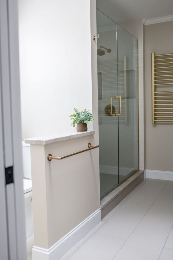 After of the Master bathroom in Hudson Ohio with updated layout getting rid of the tub and expanding the shower. Lindsey Putzier interior design 