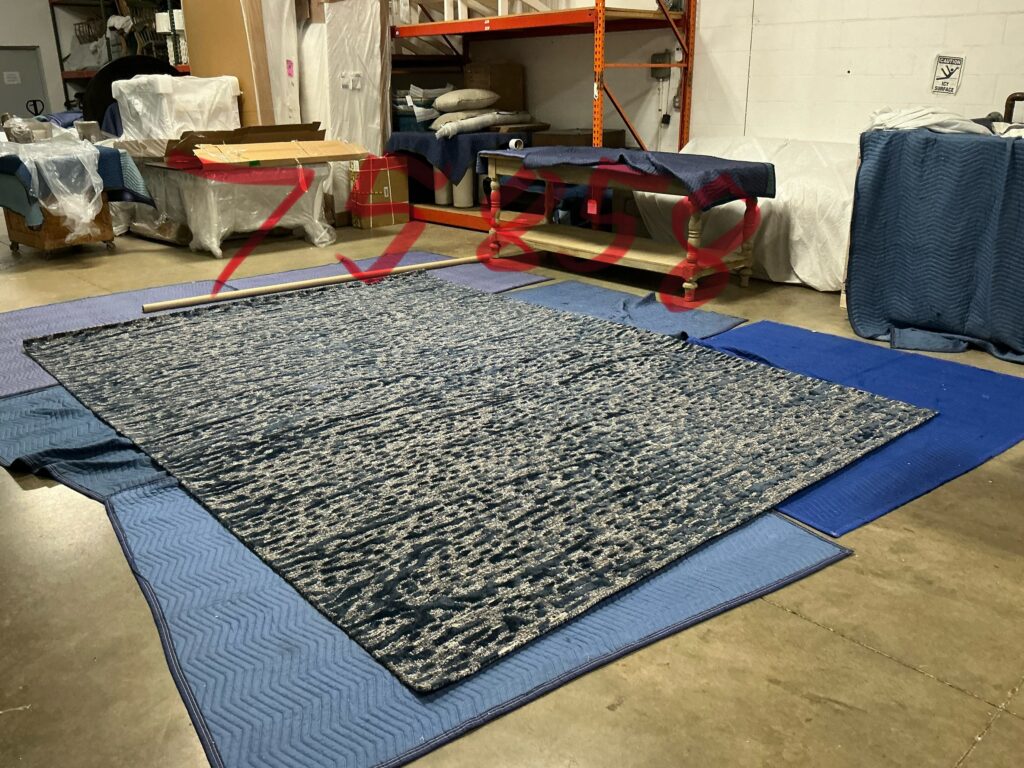 Receiving of rug with our distributor and checking for any issues. Hudson Ohio interior design Lindsey Putzier 
