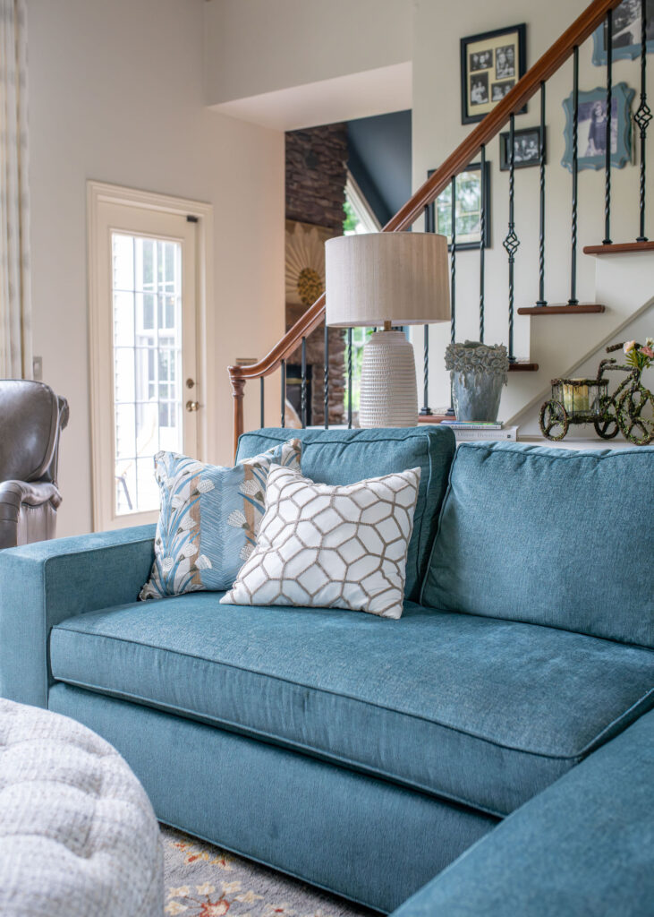 Living room with new paint, updated furniture, and new styling. Lindsey Putzier Interior Design Aurora Ohio 