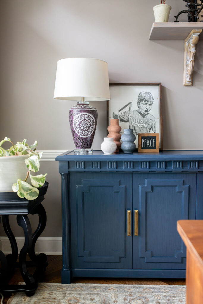 Blue sideboard in the home office with gold hardware. Lindsey Putzier Interior Design Aurora Ohio  