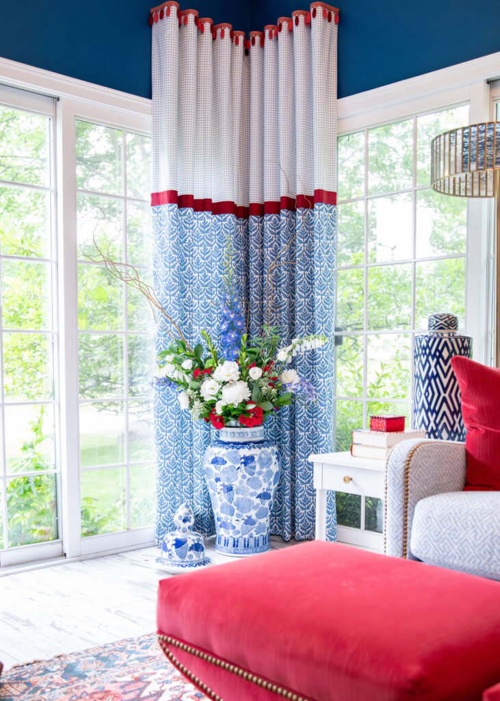 Sunroom with blue and red theme Hudson Home and Garden Show 2026, interior design, Lindsey Putzier