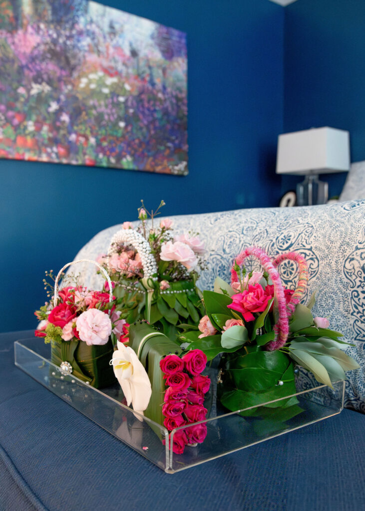 Purse flower arrangements with pink floral accents. Hudson Home and Garden Show 2026, interior design, Lindsey Putzier