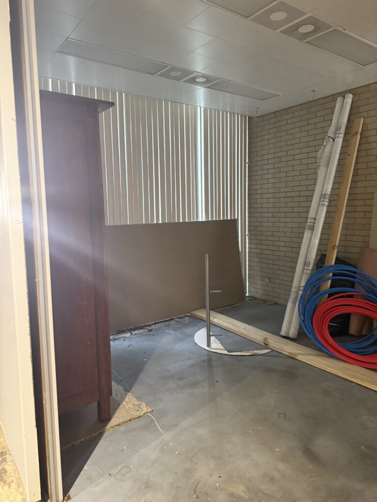Before of the conference room with dates ceilings and walls. Cuyahoga Falls Ohio. Lindsey Putzier interior design