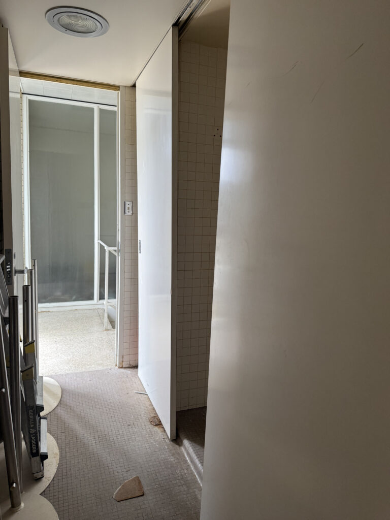 Before of the back hallway in the office. Cuyahoga Falls Ohio. Lindsey Putzier interior design