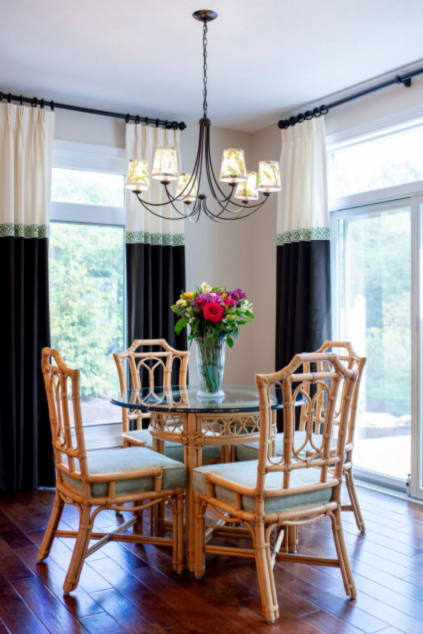 Kitchen with curtains in front of the sliding glass doors. Hudson Ohio interior design Lindsey Putzier 